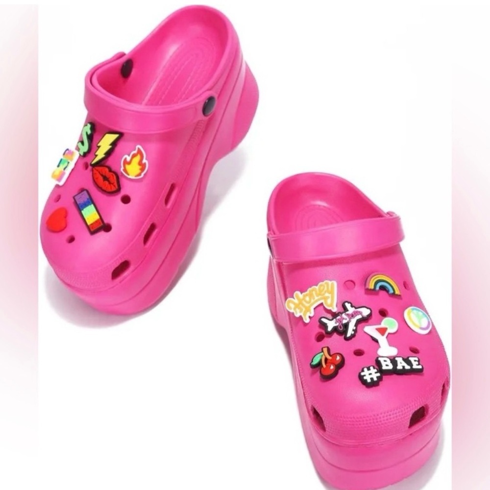 Pink platform crocs with Charms